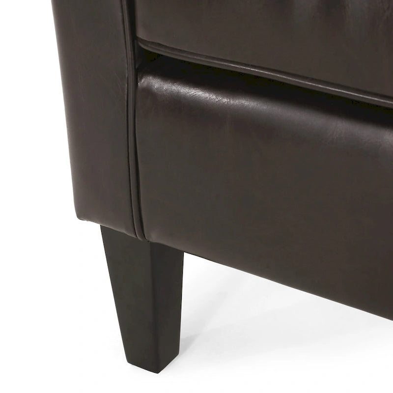 Sillón tipo club tapizado en PU de 28.75 con patas de abedul